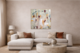 Large neutral abstract painting by Leah Justyce displayed above a sofa in a luxury neutral living room interior