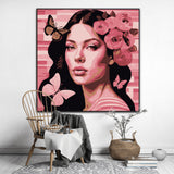 This enchanting portrait radiates with the softness and vibrancy of pink, celebrating femininity, grace, and transformation. The central figure, a serene woman, is adorned with delicate flowers and surrounded by fluttering butterflies, symbolizing beauty, renewal, and the cycles of life.
