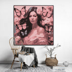 This enchanting portrait radiates with the softness and vibrancy of pink, celebrating femininity, grace, and transformation. The central figure, a serene woman, is adorned with delicate flowers and surrounded by fluttering butterflies, symbolizing beauty, renewal, and the cycles of life.